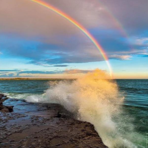 Rainbow Above The Ocean